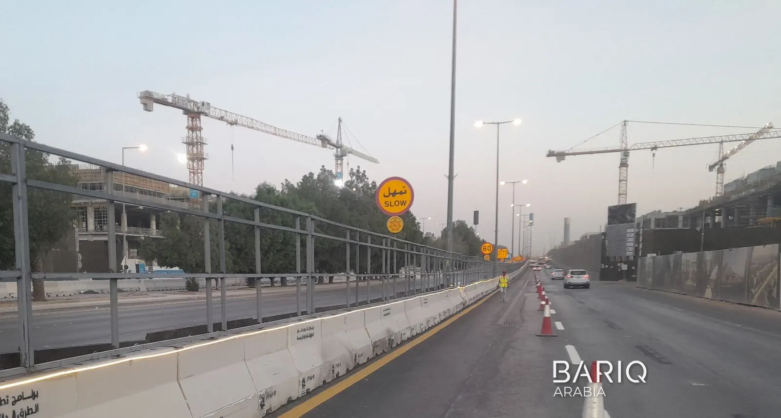 Site fence beside live traffic on Prince Turki Al Awwal Road