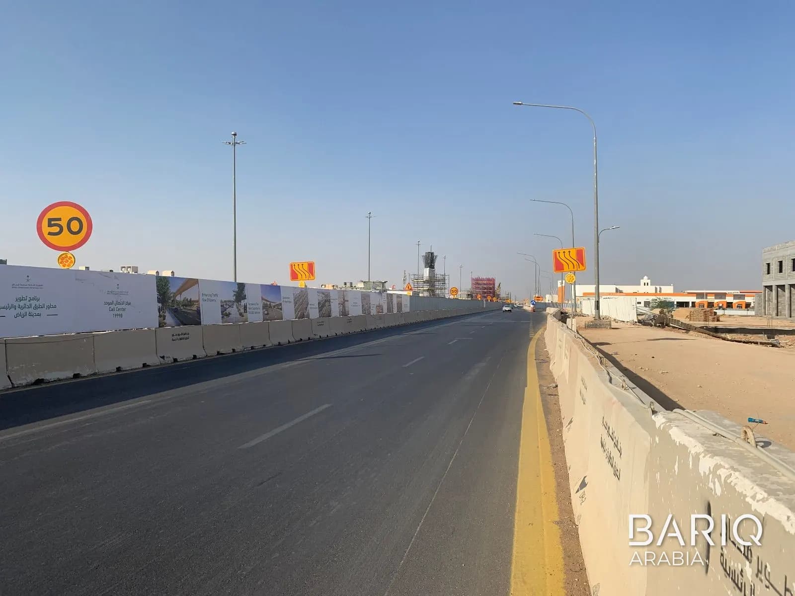 A line of precast New Jersey barriers along Dirab Road in Riyadh